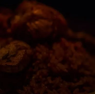 Fried plantain and rice in low light